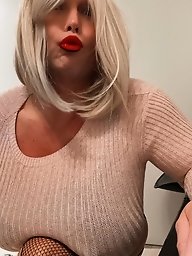 Transgender women in lingerie pose partially nude outdoors