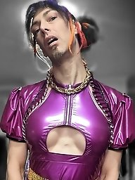 A girl in black underwear plays with a blue item that matches her dress