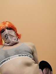 A chick in snow white underwear is having fun with a guy in his car